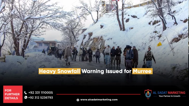 many people walking on the road and heavy snowfall covered the hills in murree