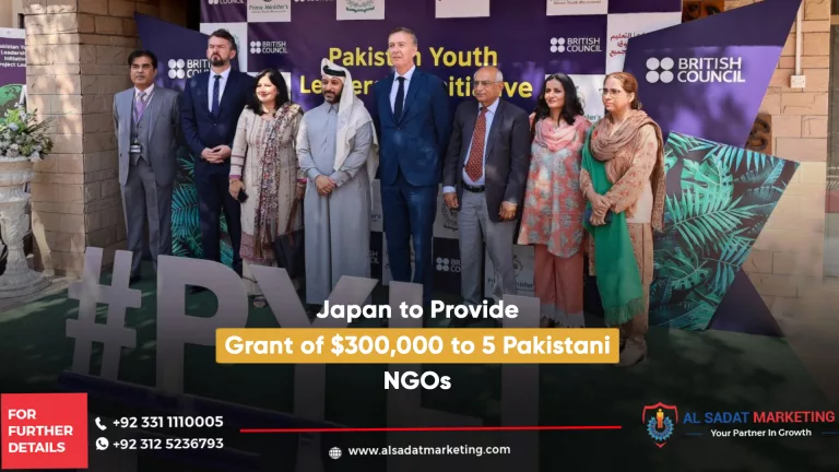 men and women standing on the occession of three lac dollars announcement for ngos in pakistan